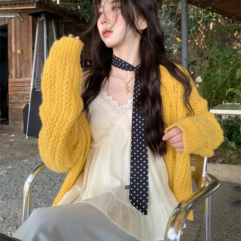 Autumn New Women's Loose Long-sleeved Cardigan Sweater Fashionable Women's Elegant Casual Knitted Hollow Versatile Top
